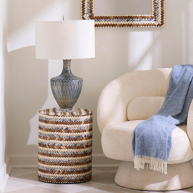 Crafted from natural bone and inlaid with exceptional care in natural hues of cream, blue and medium brown, this side...