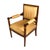 This antique French Empire-style chair offers a refined interpretation of the neoclassical elegance associated with the...