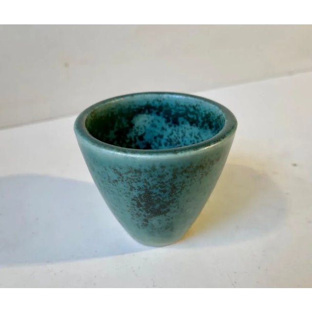 Small conical vase executed with spotted teal green hares fur type glaze. It is a a rare one made at saxbo in denmark...