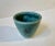 Small conical vase executed with spotted teal green hares fur type glaze. It is a a rare one made at saxbo in denmark...