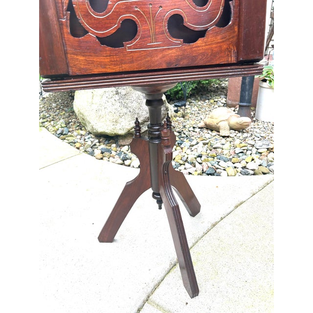 Wood Antique Mahogany, Double-Sided, Rotating Magazine/Book/Sheet Music Carrier, With Intricately Carved Fretwork Panels, Turned Handle and a Tripod Column For Sale - Image 7 of 12