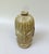 An extraordinary vase, studio ceramic, made by hand in the 1960s. The vase shows the shape of a bottle with 4 identical...