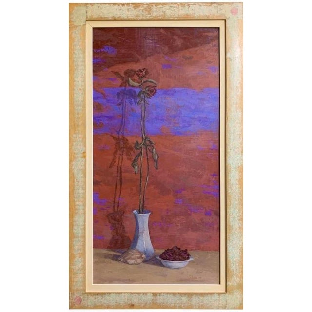 A single fish rests beside a rose on a worn surface, the two objects stripped of any narrative beyond their own presence....