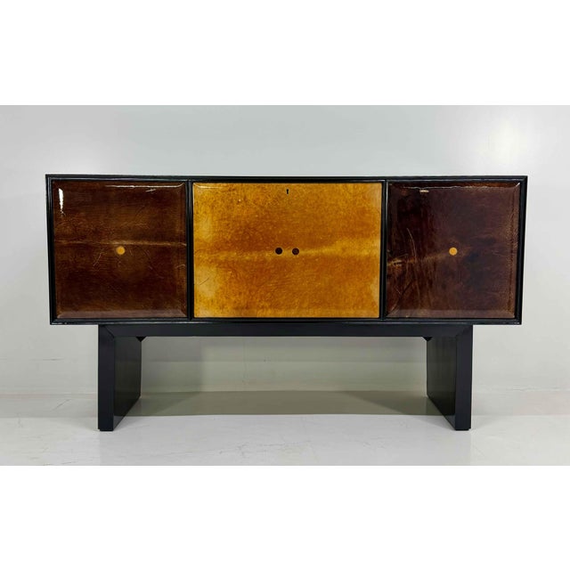 Elegant Italian Art Deco sideboard from the 1950s, produced in the Cantù area, renowned for its tradition of high-quality...