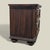 Bring timeless design into your home with this 1970s Spanish Revival nightstand in dark carved wood. Design Highlights: A...