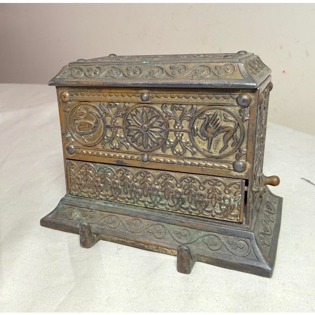Up for sale is an exquisite antique Eastlake bronze patinated metal cigarette dispenser from the early 20th century. This...