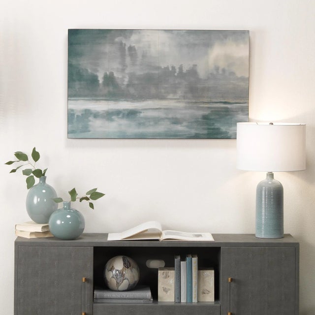 Inspired by watercolor paintings of land and sky, the Cloudscape Wall Art embraces the subtle shades of a washed...