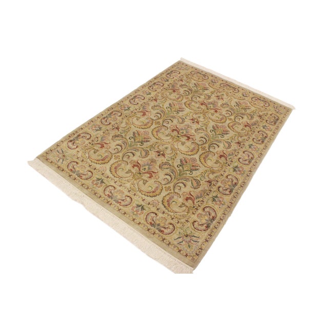 Designed with mesmerizing intricacy and gorgeous color palette, this hand-knotted masterpiece demonstrates the beauty and...