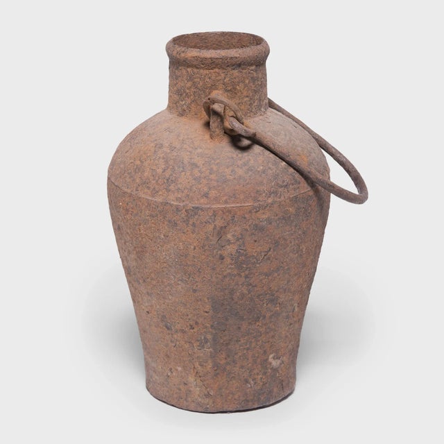 This cast-iron vessel has an elegant form reminiscent of the beautiful ironwork, bronzes, and ceramics perfected by...