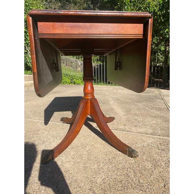 1950's Brandt Furniture Sheraton Mahogany Drop Leaf Brass Clawfoot