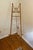 A wonderfully decorative antique scorched bamboo floor easel, dating to the late 19th or early 20th century and displaying...