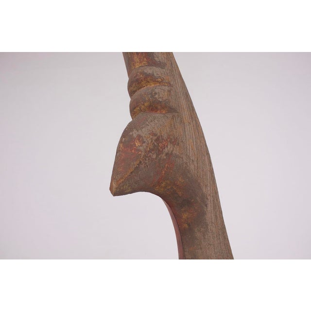 Antique chofa or (chof ​​ah) in carved wood and representing the mythical bird garuda, vehicle of the god vishnu. In thai...