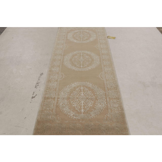 Inspired by an 18th century Spanish pattern, this modern wool and silk rug features a Catana design, characterized an...