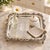 An elegant vintage silver-plated serving tray by the Poole Silver Company of Taunton, Massachusetts. This square tray...