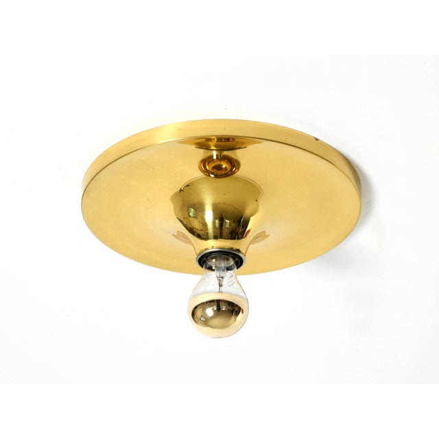 Minimalist original mid-century modern space age ceiling or wall lamp made of brass. typical space age design from the...