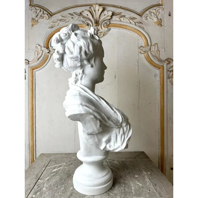 Bisque bust of a young woman. After carrier-belleuse, signed on the back, circa 1900. Provenance a singular interior in...