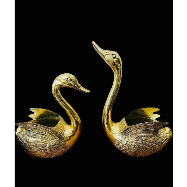 Large scale sculptural metal brass swan, simply gorgeous, restored to its original glory days. They are made/signed Korea...
