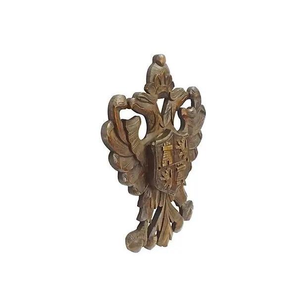 Antique; 19th century, German, Black Forest, eagle crest, wall plaque with two holes for mounting. Depicts German symbol...
