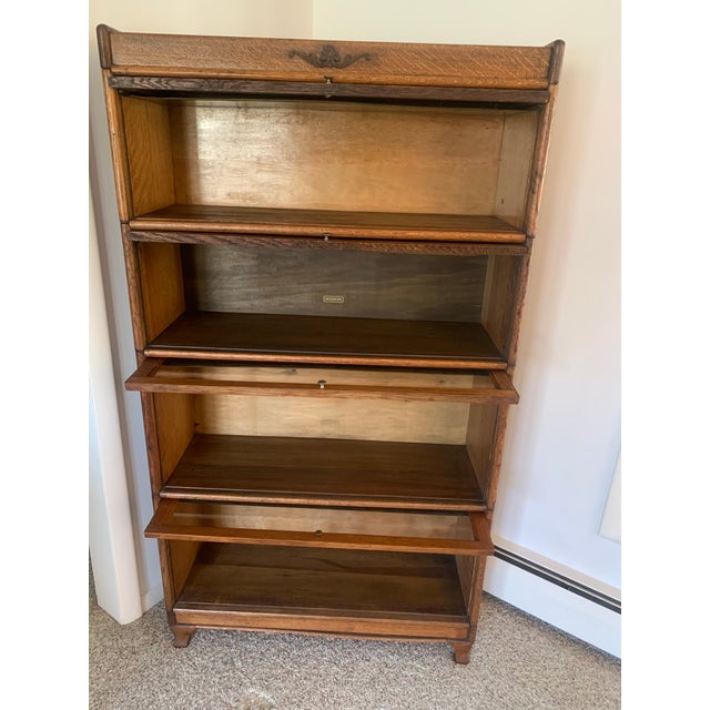 Made in Detroit Michigan by Widman Furniture, two sections have the label on the inside, all have some factory stenciled...