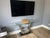 Elite Modern contemporary console table purchased at Cantoni in Dallas. A thick tempered-glass top rests above a...