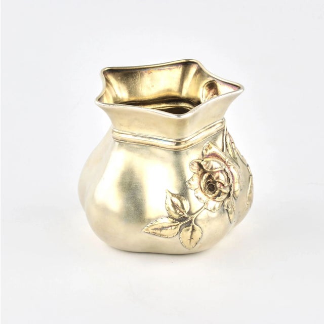 Elegant silver box / vase in the form of a bag tied with a ribbon. A rose is deftly woven into the bow of the ribbon,...