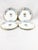 A striking and exceptionally rare set of four (4) antique French porcelain plates. Featuring a beautifully rendered...