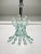 Curved art glass and steel chandelier pendant by o4 (zero quattro) edited by fontana arte, milano, italy in the 1970s. The...