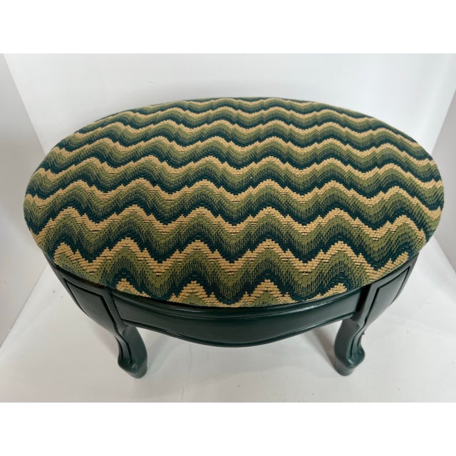 Queen Ann style carved wood bwnch with graceful cabriole legs. Recently reupholstered with Old World Weaver Irate...