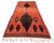 Midcentury Medouna rug hand woven with dark terracotta, charcoal and dark brown wool in a dynamic geometric Berber design....