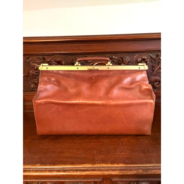 Rare vintage Italian leather bag with brass frame made for Mercedes-Benz. Perfect for any vintage Mercedes collector.