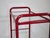 Metal and glass trolley from the 1980s. Clean, functional design with multiple glass shelves on a rolling metal frame....