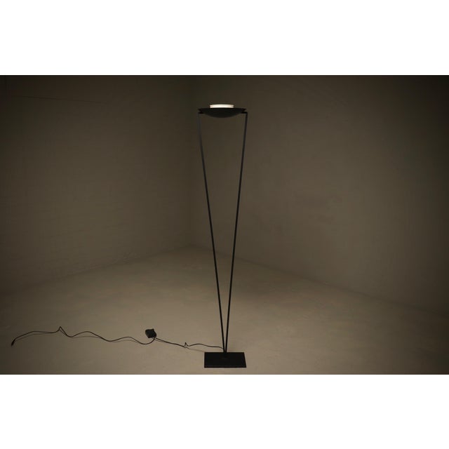 Floor lamp model “Victory” designed by Artoff for Lumen Center, Italy, produced in 1984. The piece has a slender...