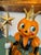 Whimsical. Cheerful. Vintage Inspired Halloween Girl, Pumpkin Head Sculpture, with a Crown and Wand with Star. She is...