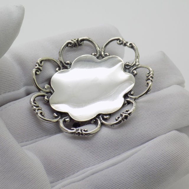 A vintage miniature depicting a centerpiece, crafted in arezzo between the 1980s and 1990s in solid continental silver. a...