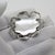A vintage miniature depicting a centerpiece, crafted in arezzo between the 1980s and 1990s in solid continental silver. a...