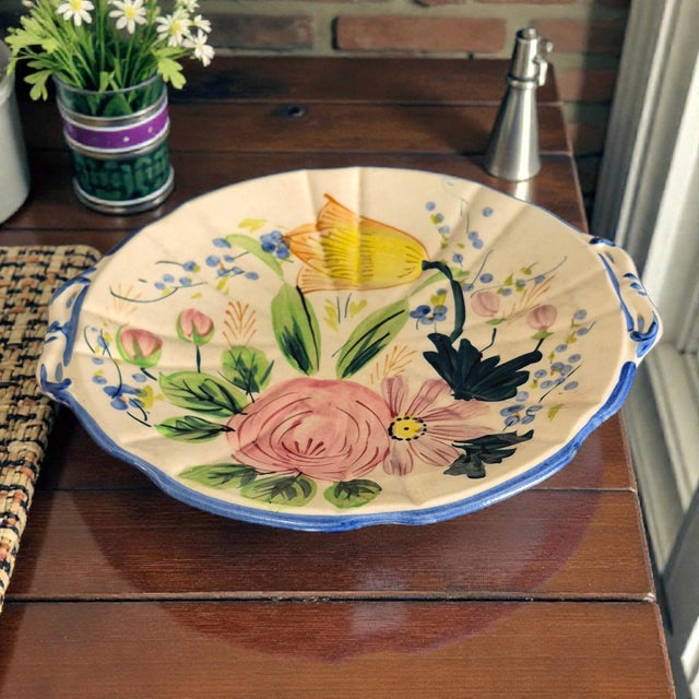 This vintage hand-painted floral serving platter, made in Japan, showcases intricate details with a multicolor floral...