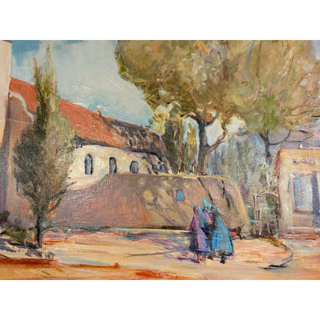 This beautiful mid-century Southwestern oil on canvas painting, titled "Church at Los Corrillos" by artist Betty Carlson,...