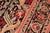 1990s Ikat Floral 1990's Pak-Persian Black/Red Wool Rug - 6'0'' X 9'5'' For Sale - Image 5 of 9