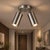 Crafted in solid brass, this double spotlight ceiling light features two cylindrical shades mounted on adjustable joints,...
