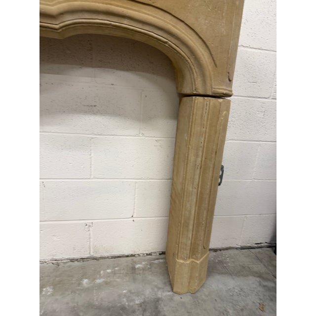 French Louis XV Style Limestone Mantel.