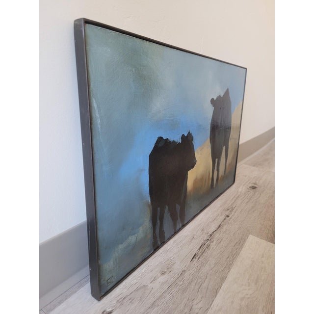 Abstract Herd Rhythm by Emma Kalff | Oil on panel Painting of two silhouetted cows against a blue background For Sale - Image 3 of 5
