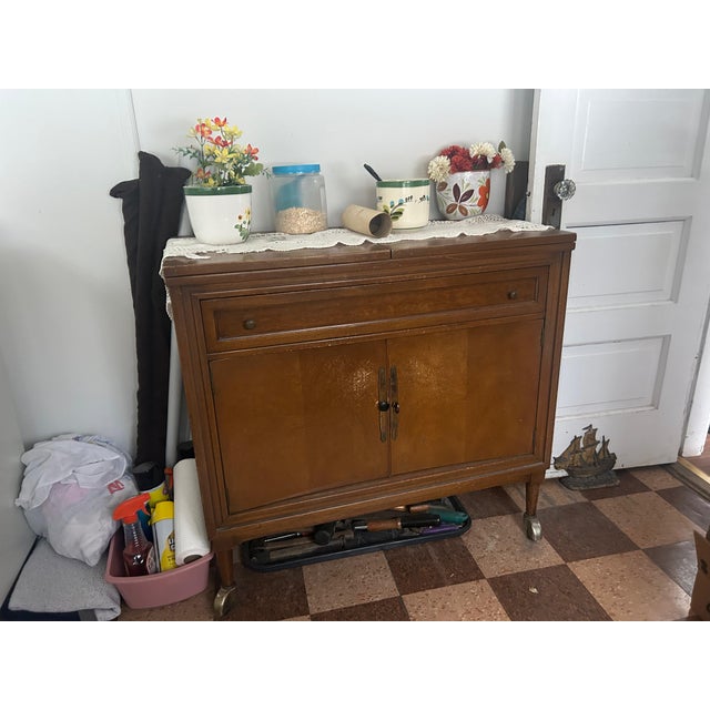 The lower double doors typically open to reveal storage.