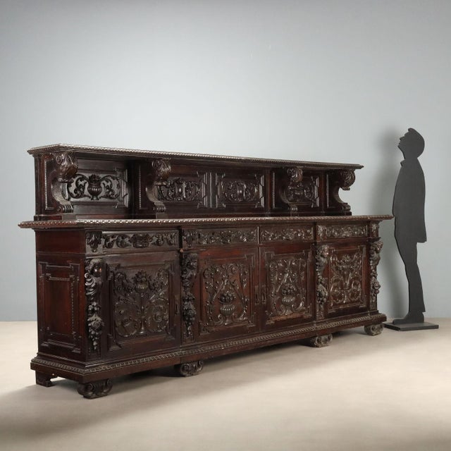Neo-Renaissance style sideboard made of ebonized walnut, dating back to the late 19th century in Italy. The base of the...
