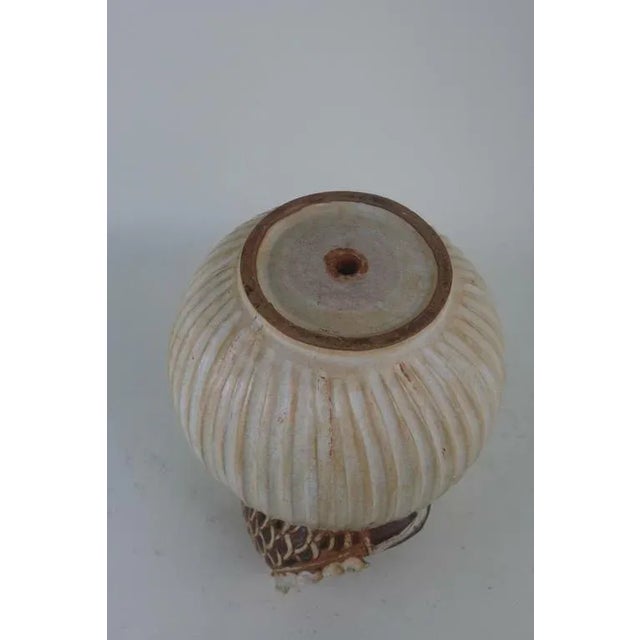 A Vintage large impressive artistic Thai ceramic stylized fish topped vase, with ribbed detailed surface container,...