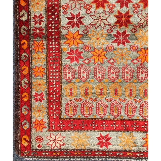 Measures: 4'3 x 6'3. Antique Persian Hamadan Rug with Colorful Star Motif and Repeating Medallion. Keivan Woven Arts / rug...