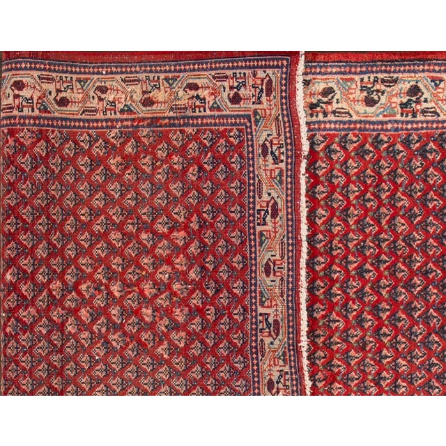 Beautiful Vintage Hamadan Handmade Wool Rug with a red field. This rug has multi-color accents in an allover geometric...