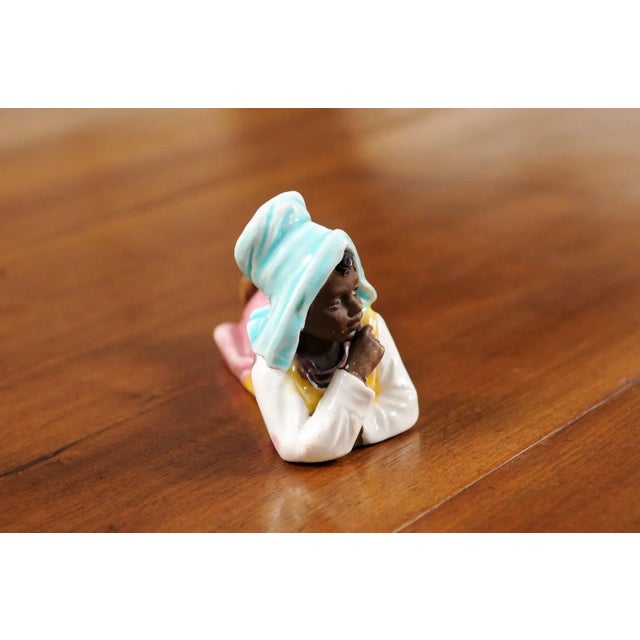 White Vintage Petite English Porcelain Figurine Depicting a Young Girl Laying on the Ground For Sale - Image 8 of 13