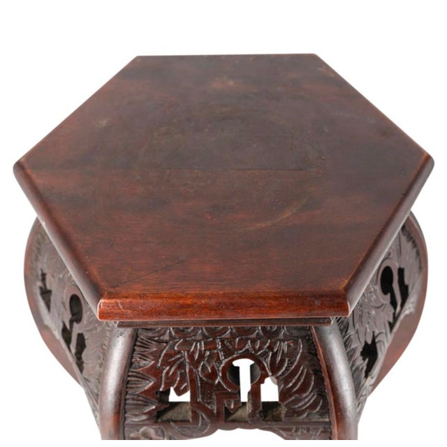 Just in, this Antique Chinese Carved Wood pedestal or Stool. Nicely hand carved on all sides. The color is of a deep...