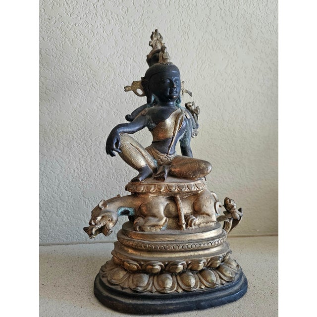 19th Century Nepalese Bronze Lokeshvara (Padmapani) on Chimera Details A finely cast late 19th-century Nepalese bronze...