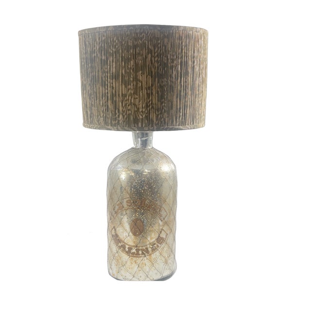 Enhance your home decor with our pair of Decorative Ceramic Lamps. These unique mercury glass lamps add a touch of...